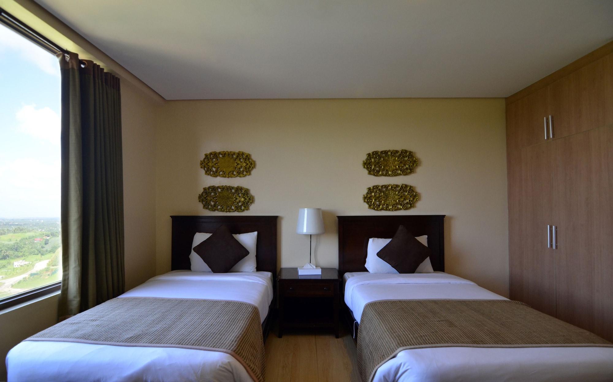 טגאיטאי Crosswinds Resort Suites מראה חיצוני תמונה