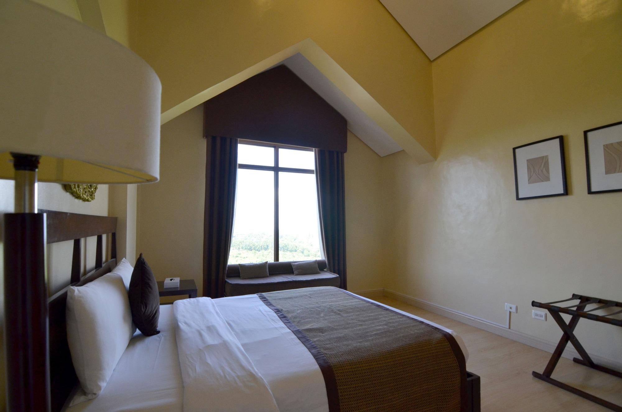 טגאיטאי Crosswinds Resort Suites מראה חיצוני תמונה