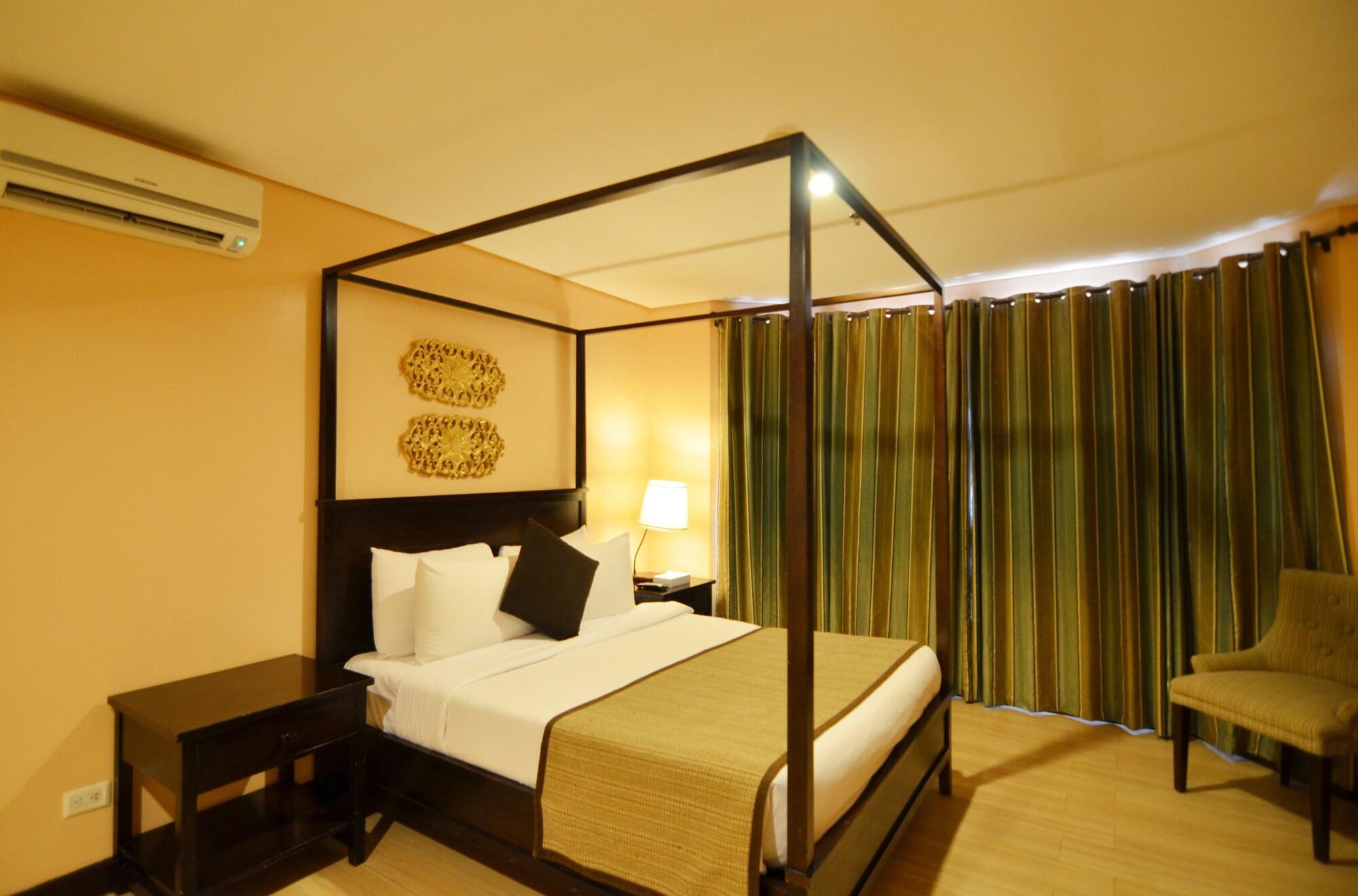 טגאיטאי Crosswinds Resort Suites מראה חיצוני תמונה